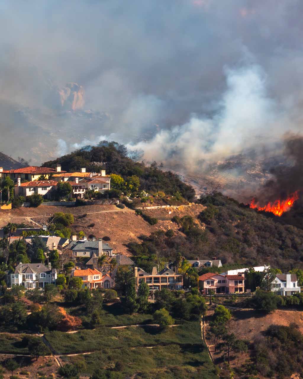 wildfire on mountain near homes california